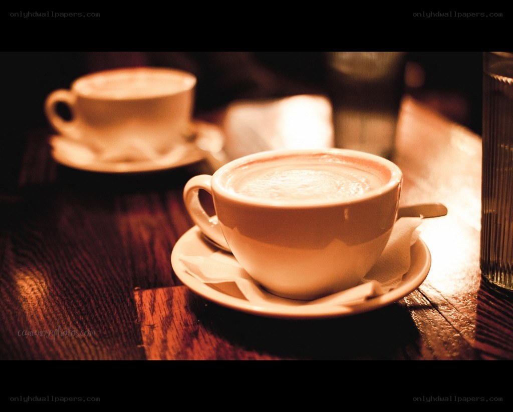Two cups of coffee on a table
