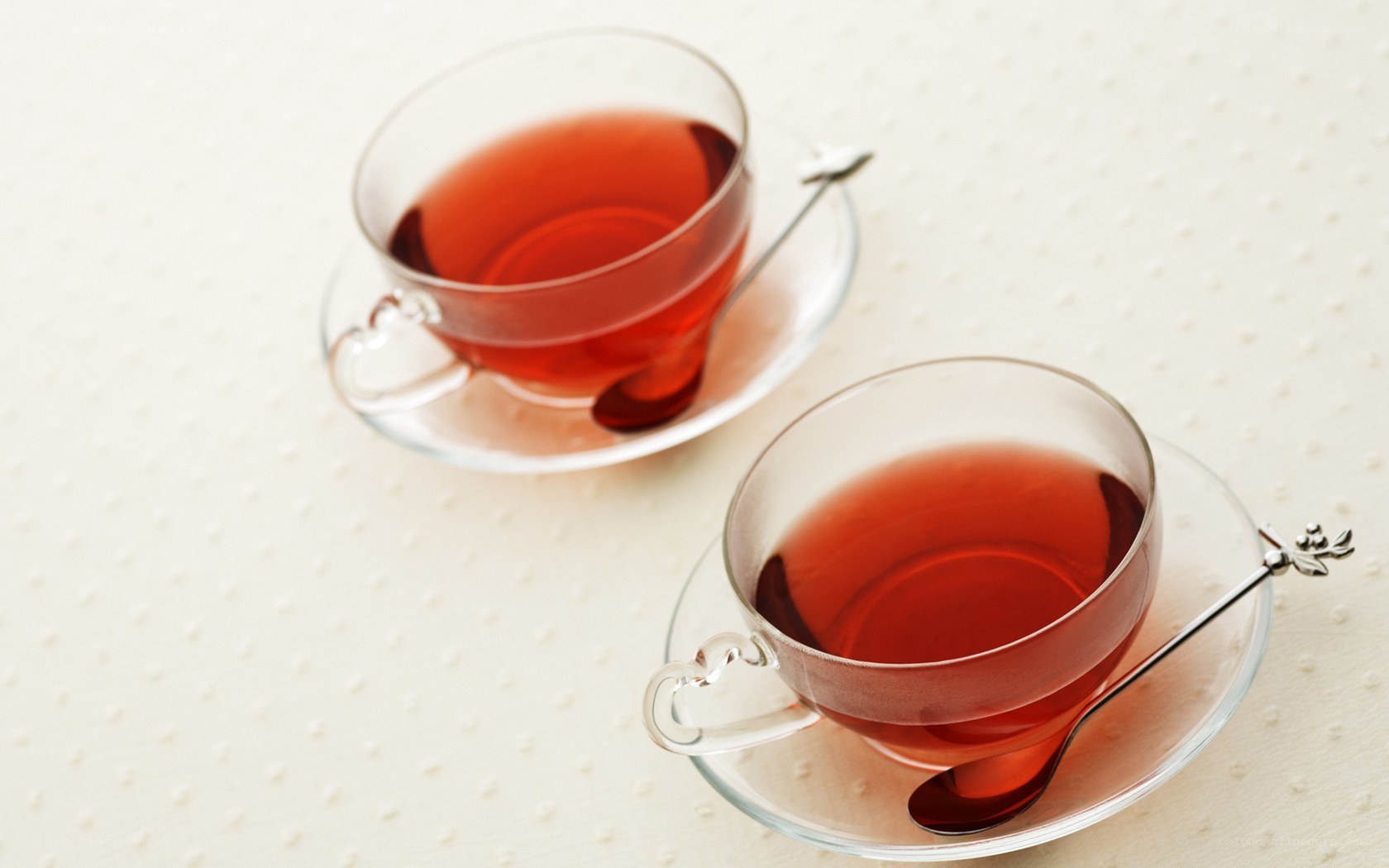 Two cups of tea on table