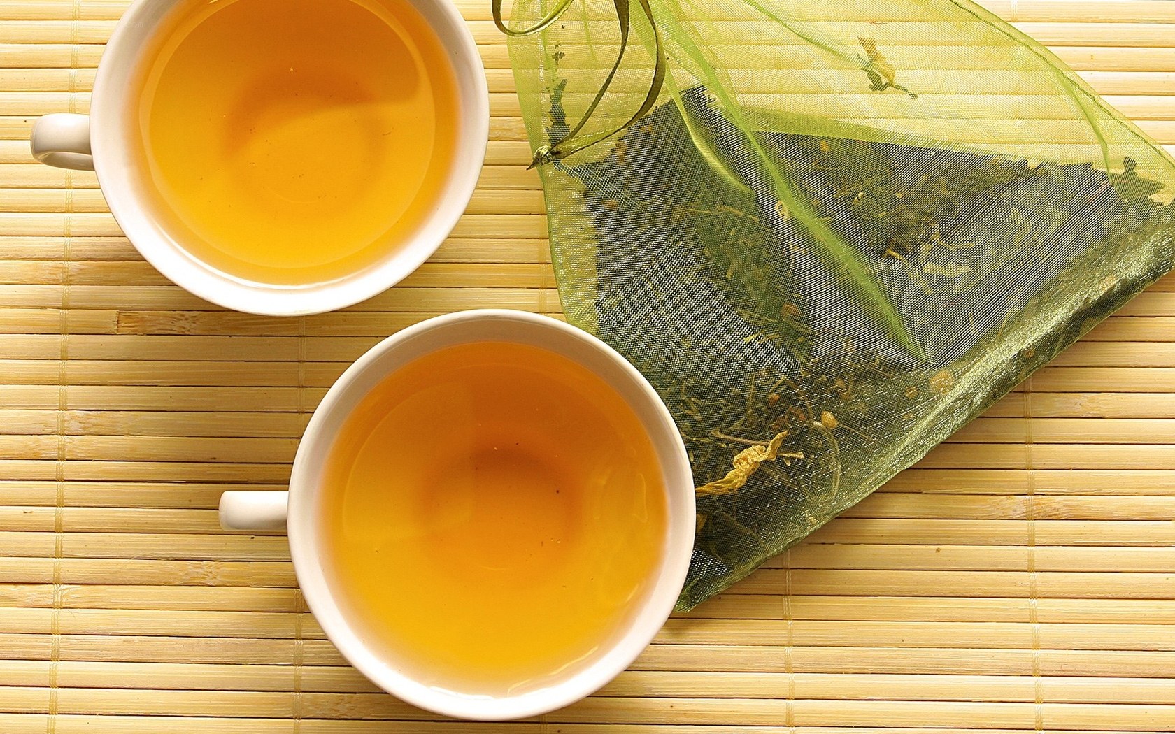 Two cups of tea with tea bag