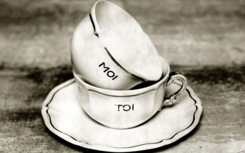 Two cups with words on them