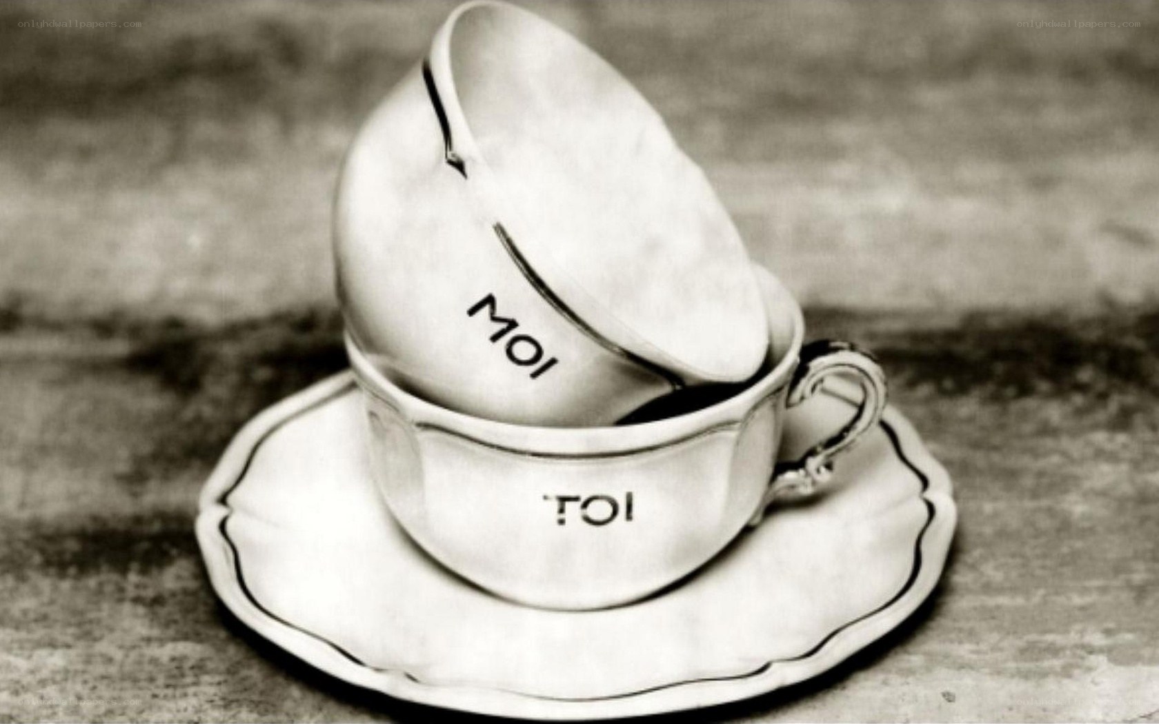 Two cups with words on them