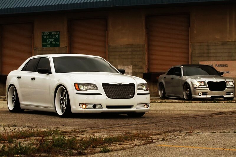 Two customized Chrysler sedans