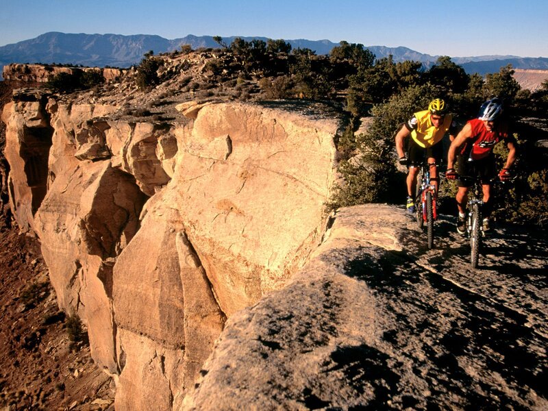 Two Cyclists on Cliff — Brown