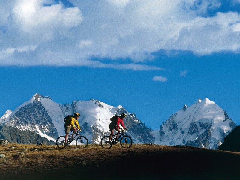 Two Cyclists on Mountain — Blue