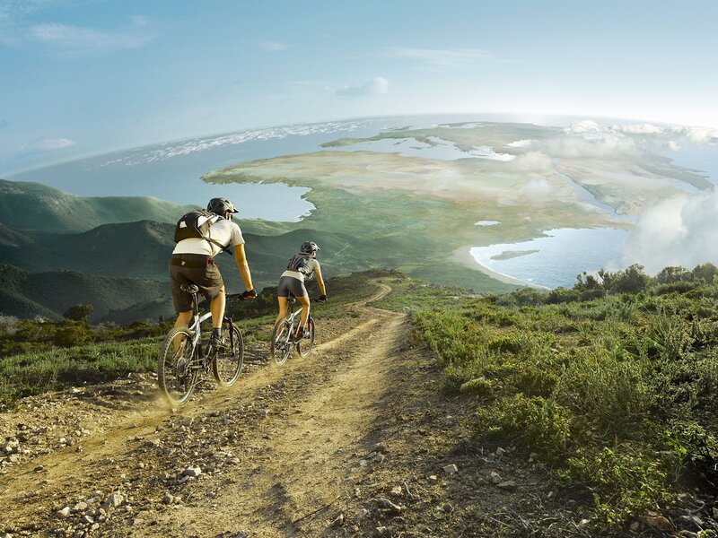 Two Cyclists on Trail — Green