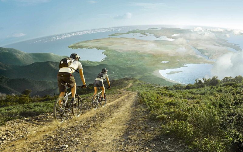 Two Cyclists on Trail