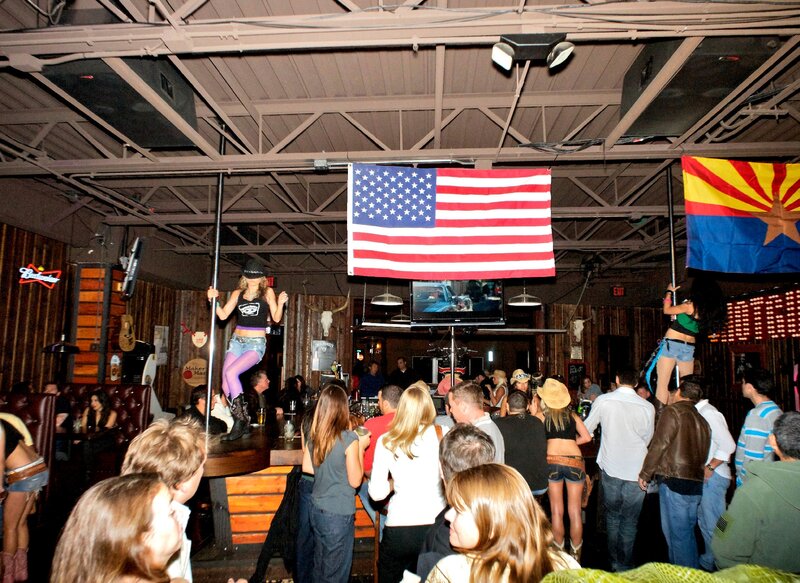 Two Dancers on Poles