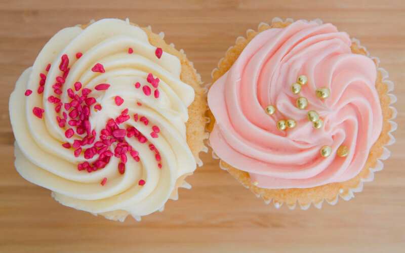 Two Decorated Cupcakes — White