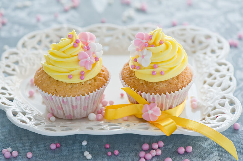 Two Decorated Cupcakes — Yellow