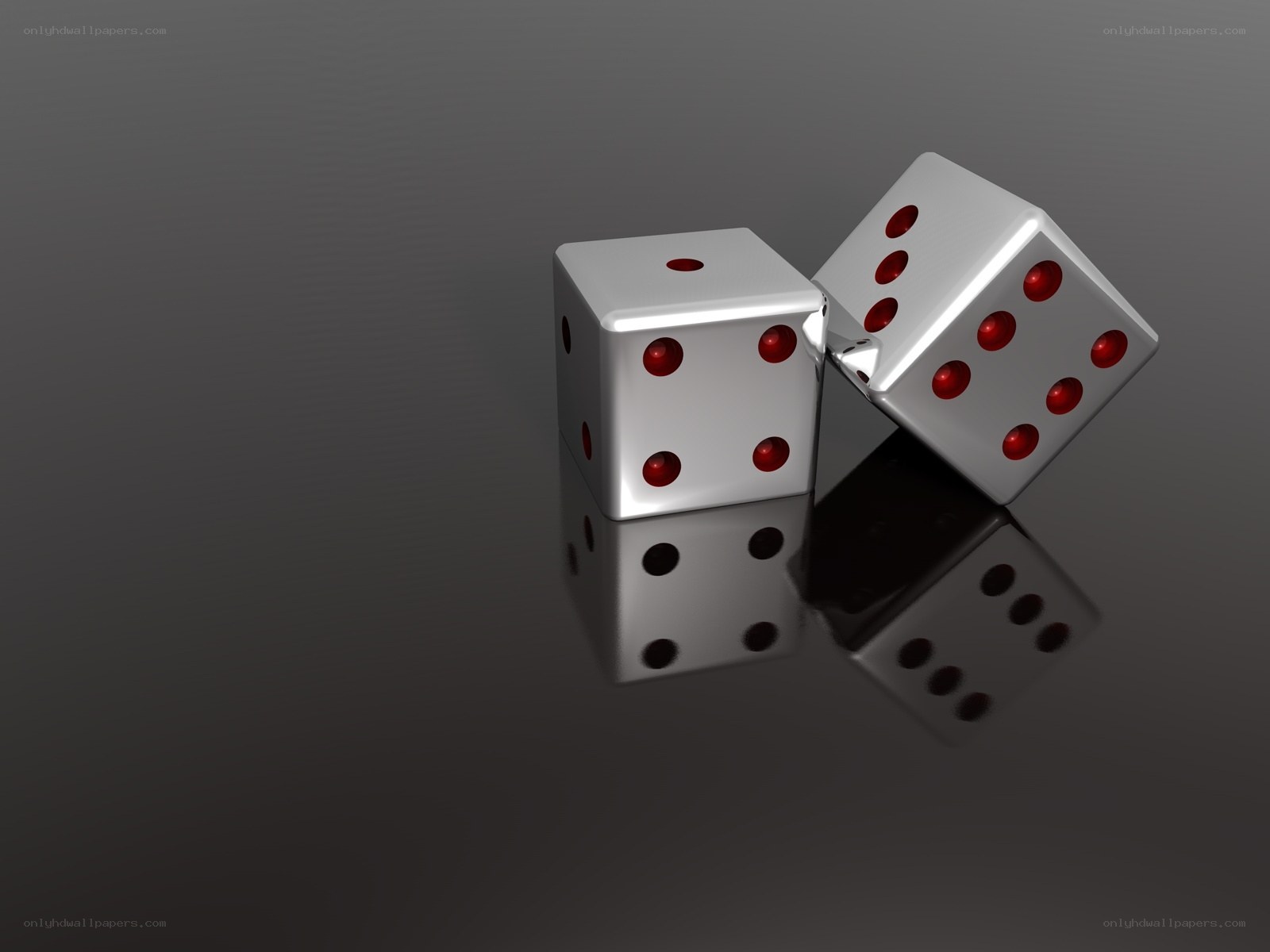 two dice on reflective surface