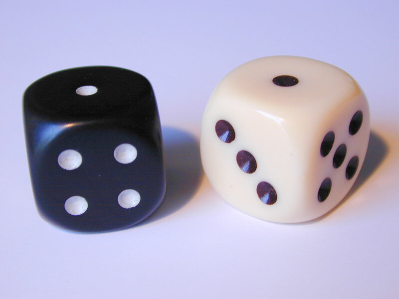 Two Dice on White Surface