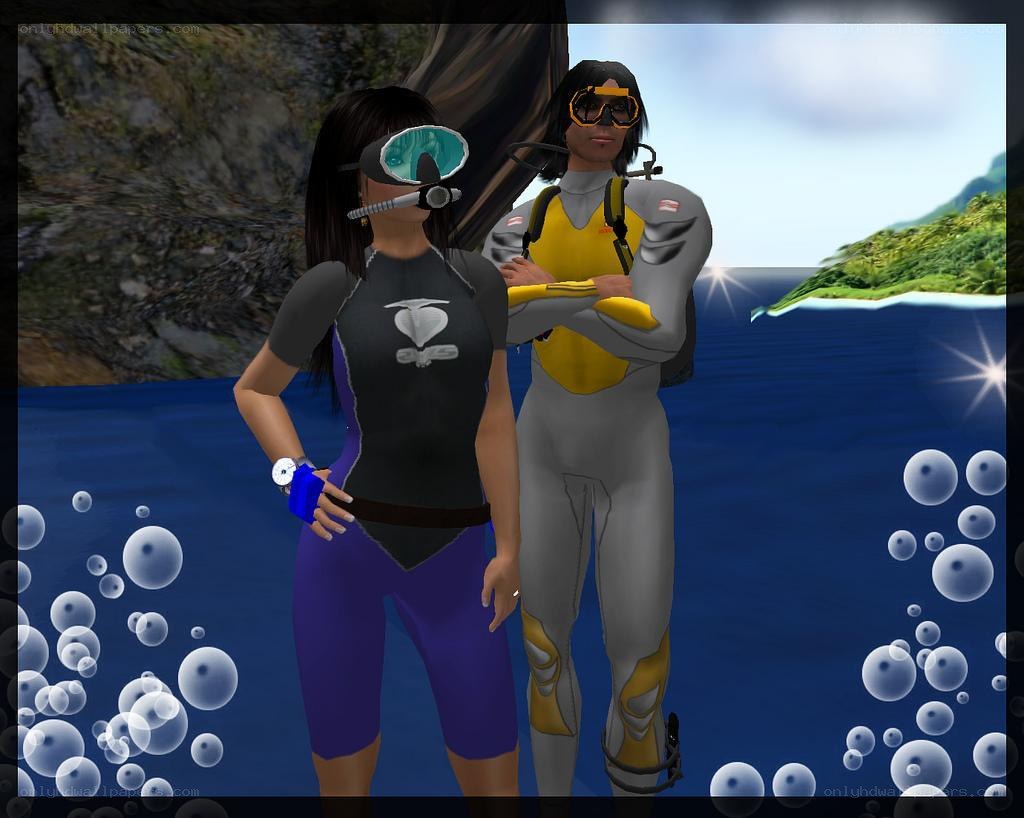 two divers in wetsuits