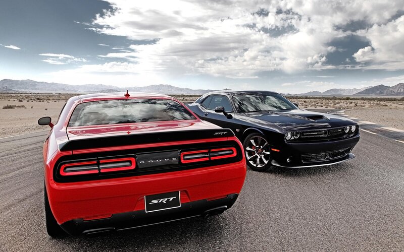 Two Dodge Challengers — Red