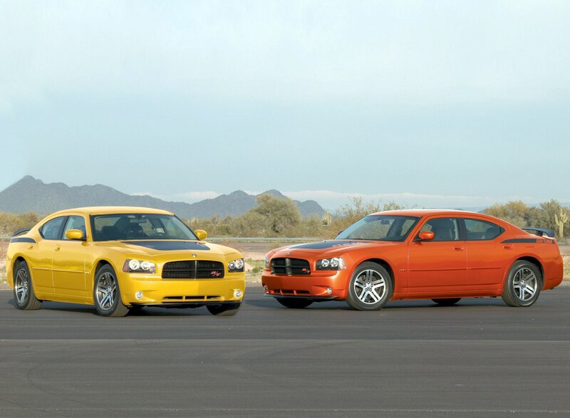 Two Dodge Chargers on a track