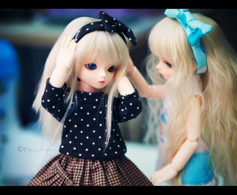 Two Dolls Interacting