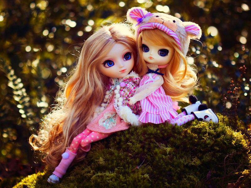 Two Dolls on Moss
