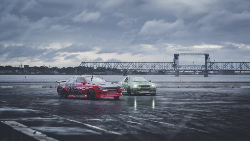 Two Drifting Cars — Red, Dramatic, Afternoon