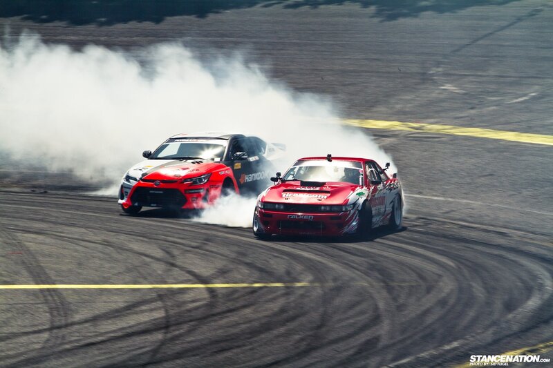 Two Drifting Cars — Red, Dynamic, Afternoon, Photograph