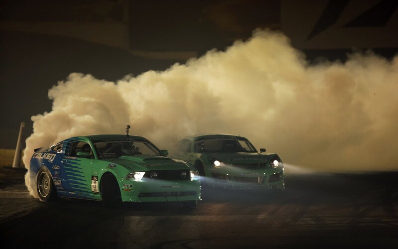 Two Drifting Cars