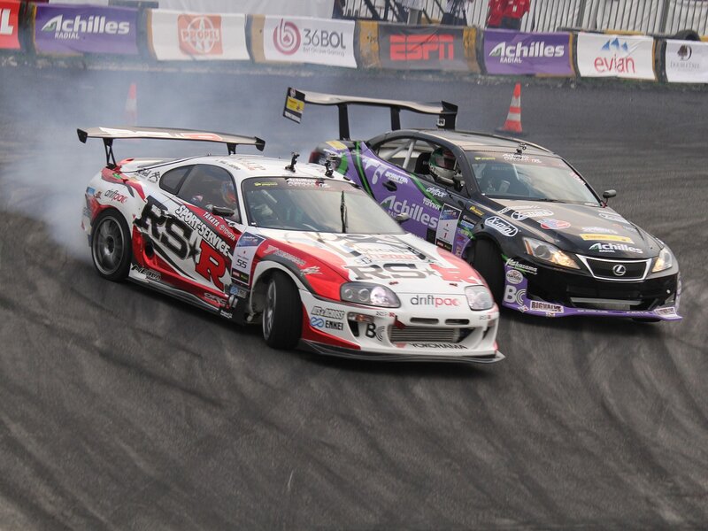 Two Drifting Race Cars