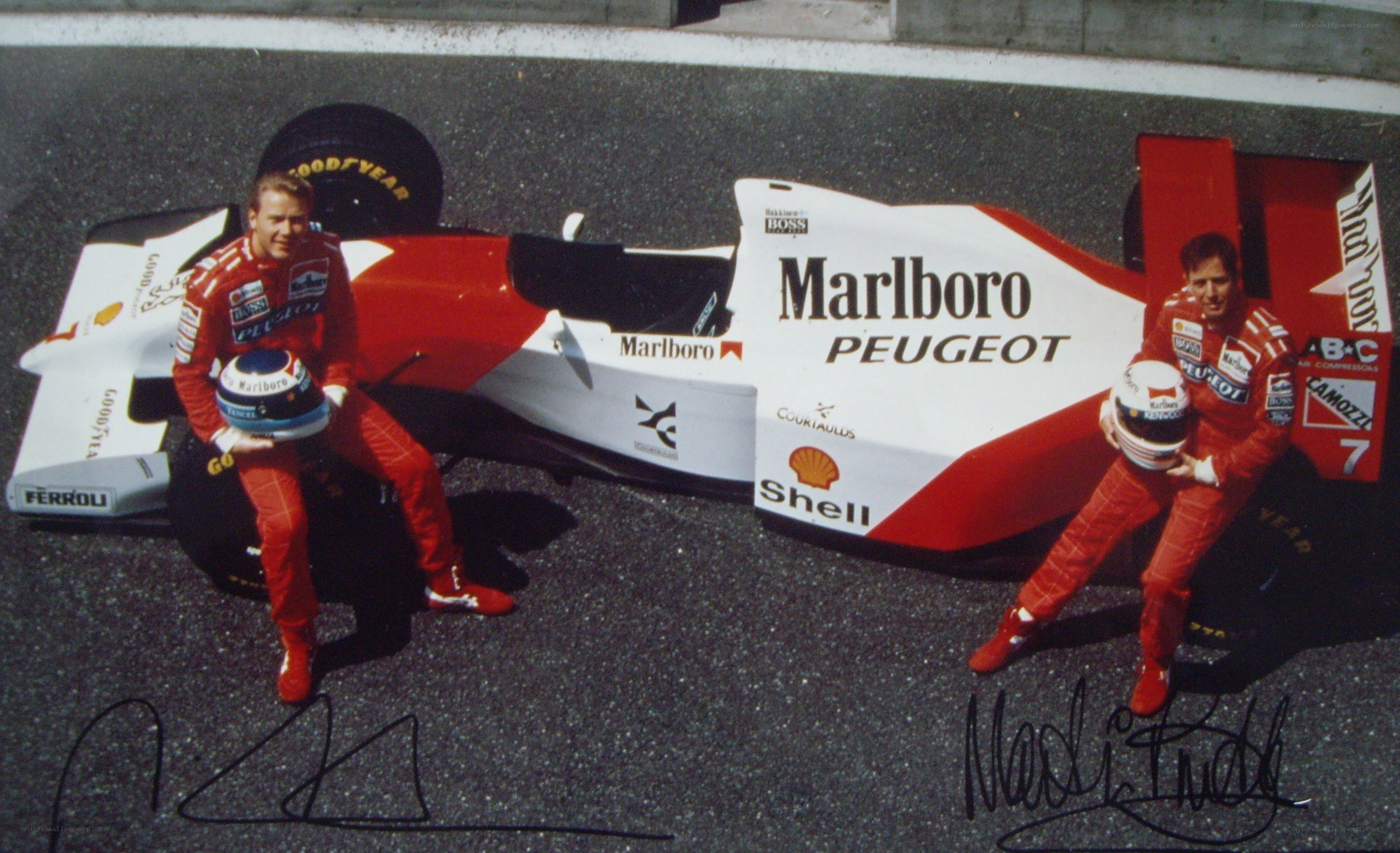 Two drivers with a race car