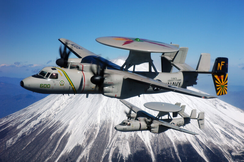 Two E-2 Hawkeye aircraft in flight