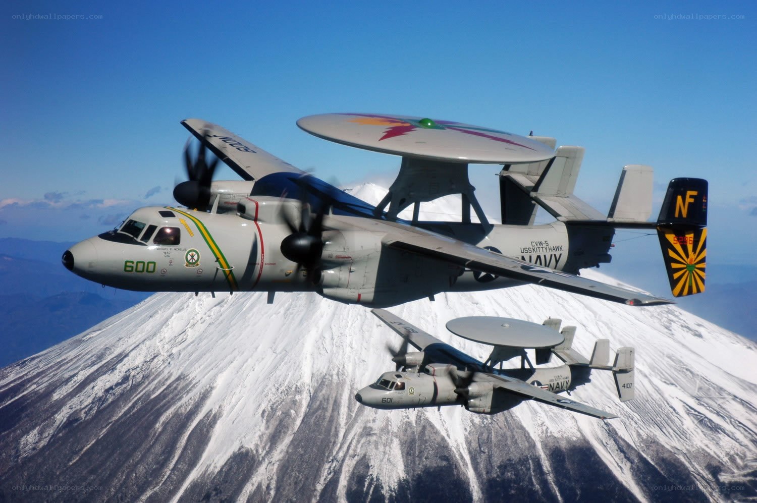 Two E-2 Hawkeye aircraft in flight