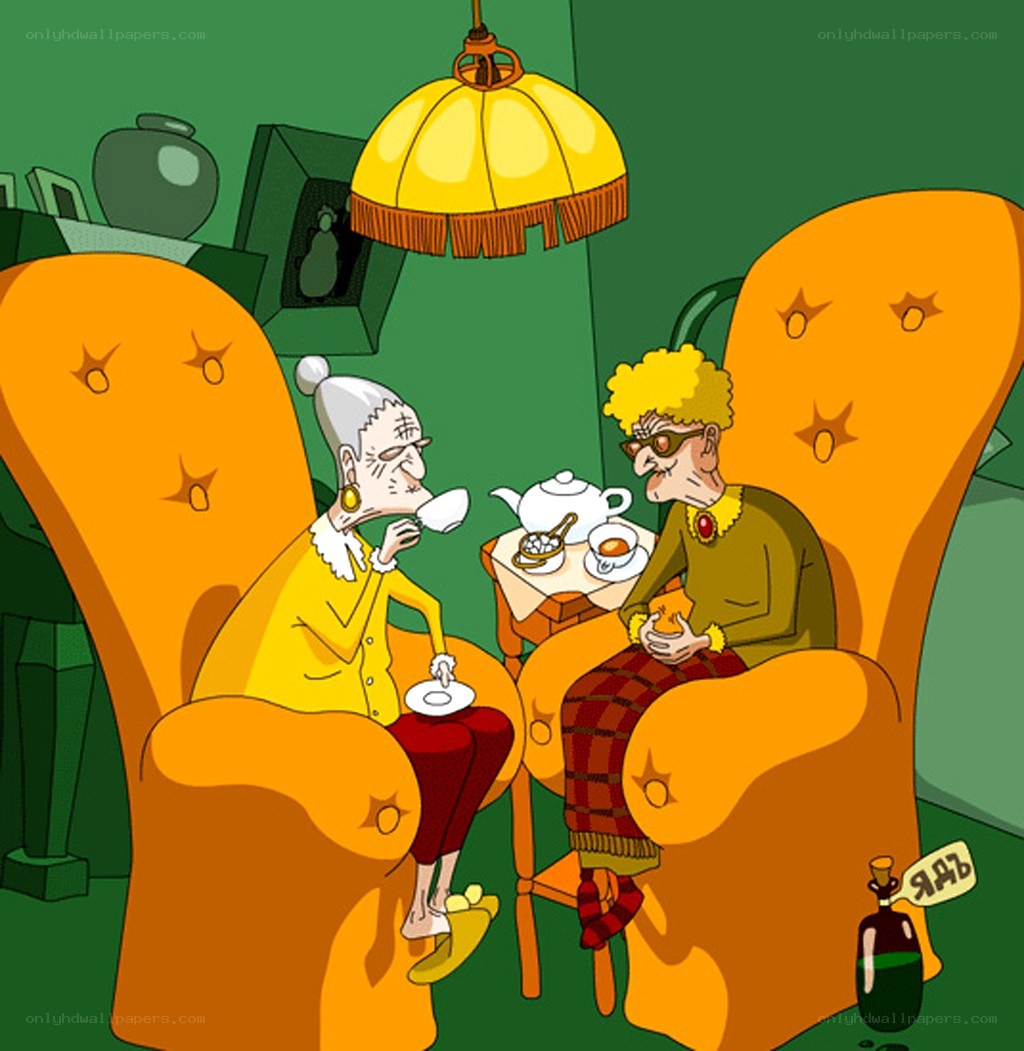 Two elderly women having tea