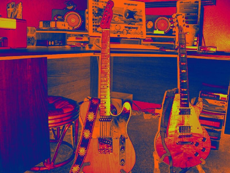 Two Electric Guitars — Red