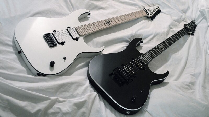 Two Electric Guitars — White