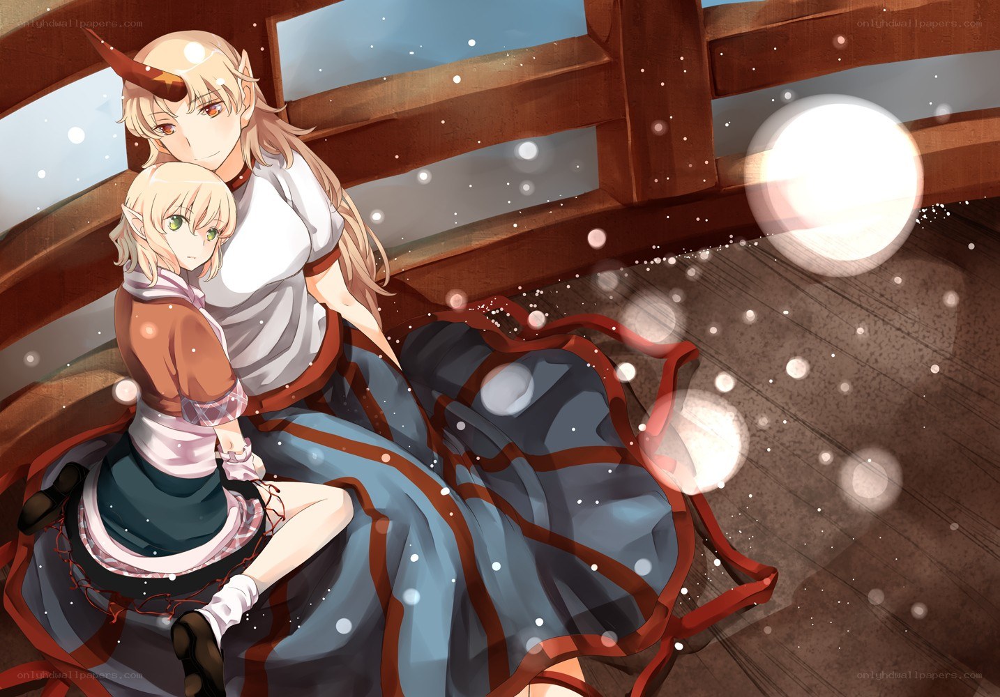 Two elf girls on a wooden deck