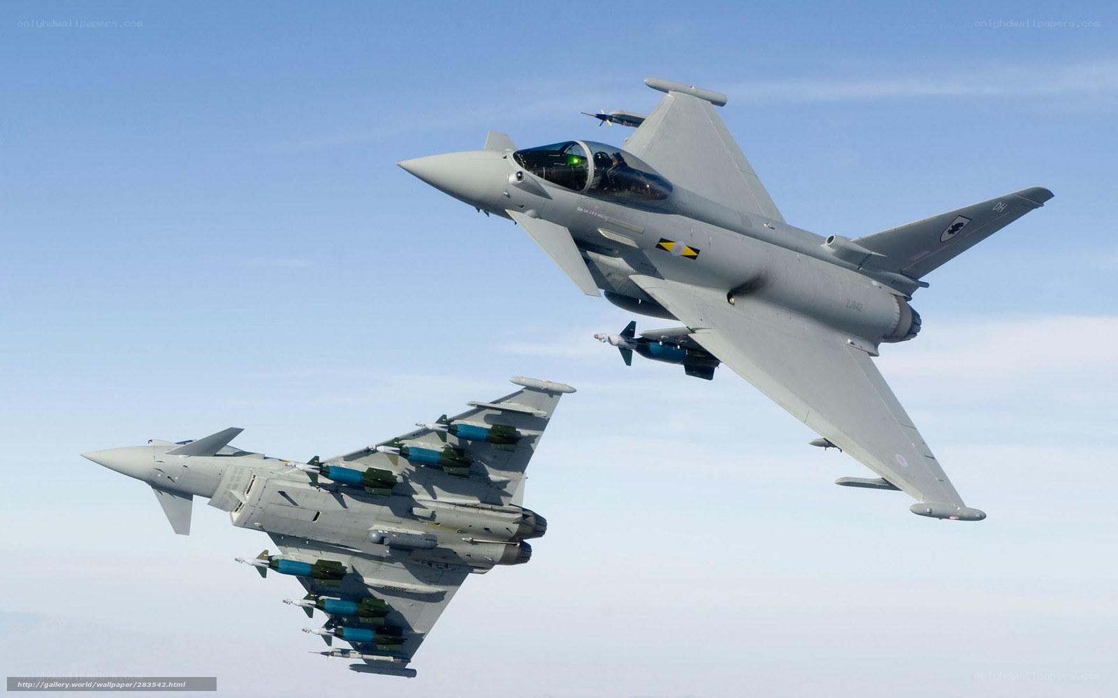 Two Eurofighter jets in flight