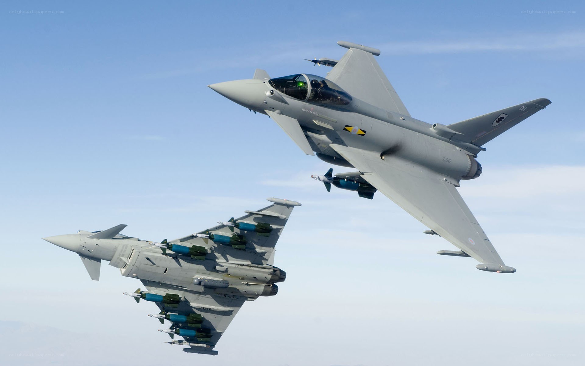 Two Eurofighter jets in flight