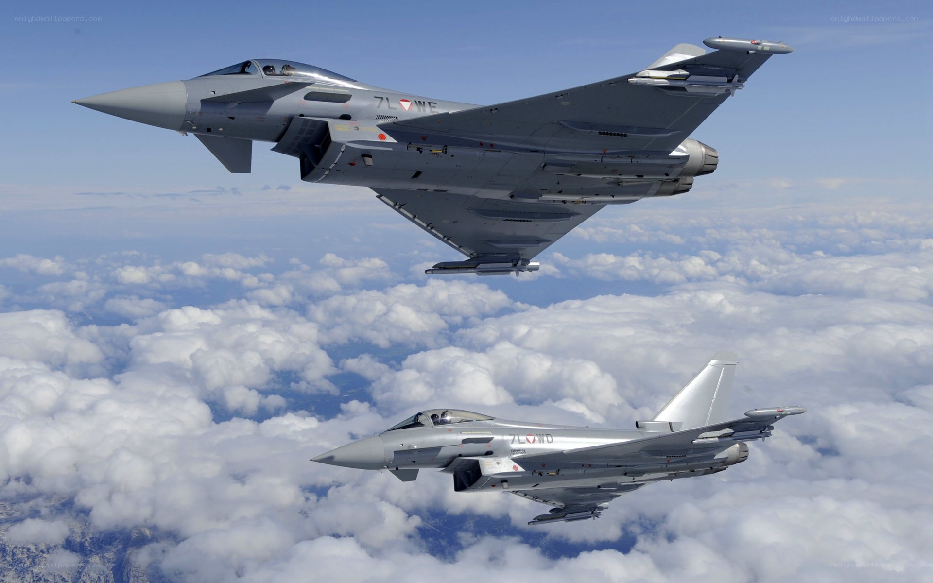 Two Eurofighter jets in flight