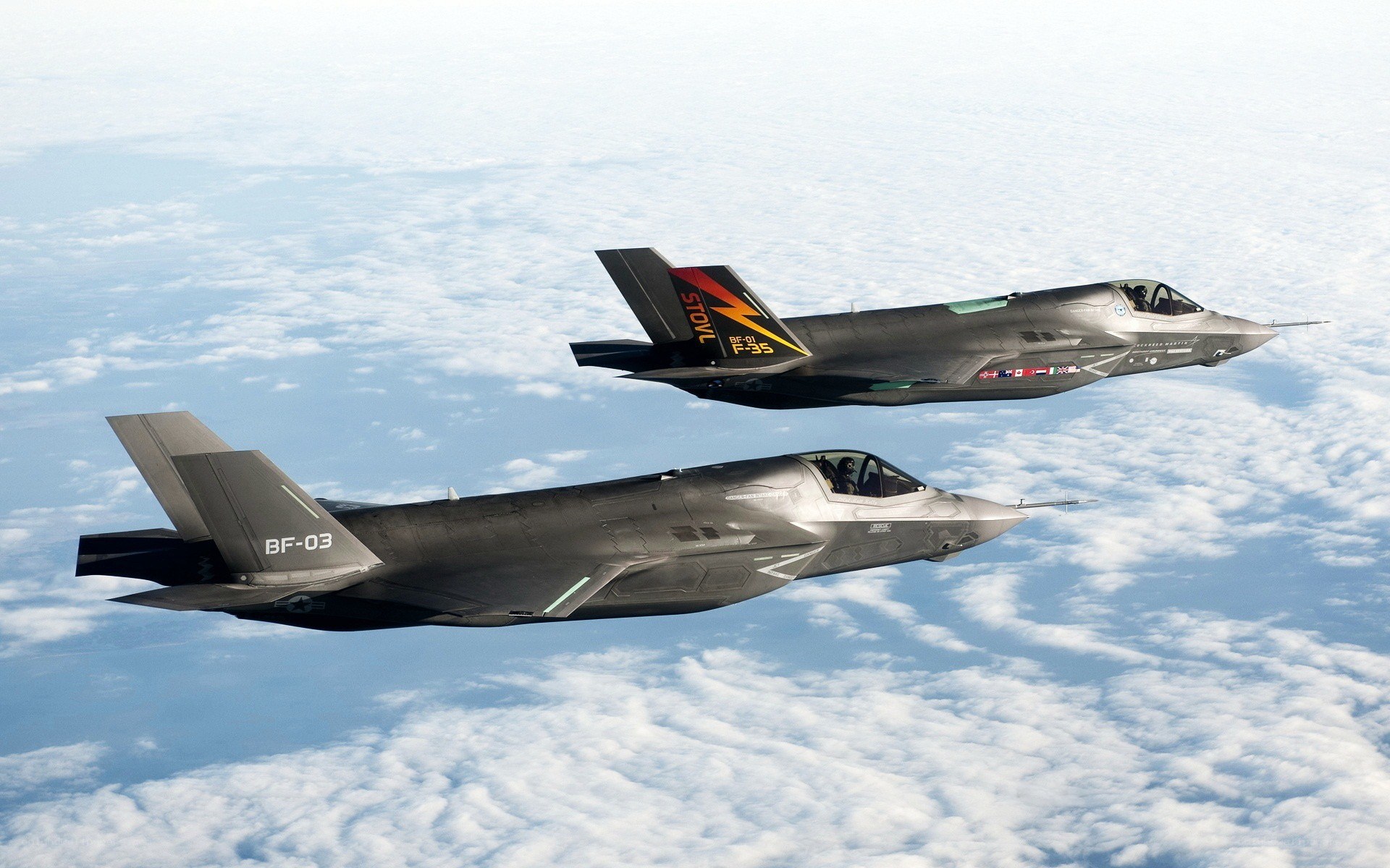 Two F-35 fighter jets in flight