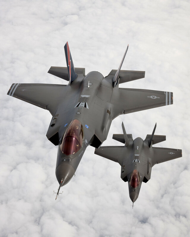 Two F-35 fighter jets in flight