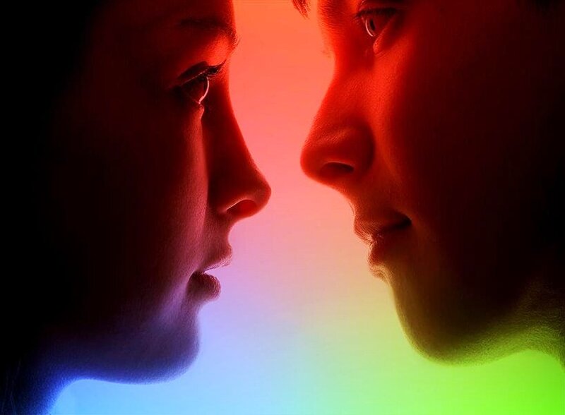 two faces in rainbow light