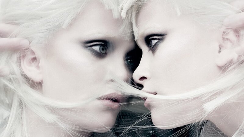 two faces with white hair