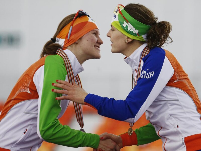 Two Female Athletes — Orange