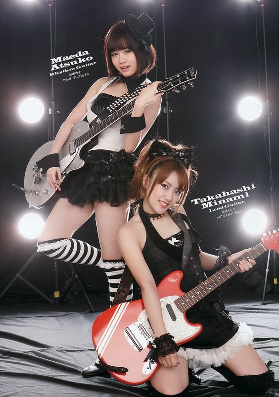 Two female musicians with guitars