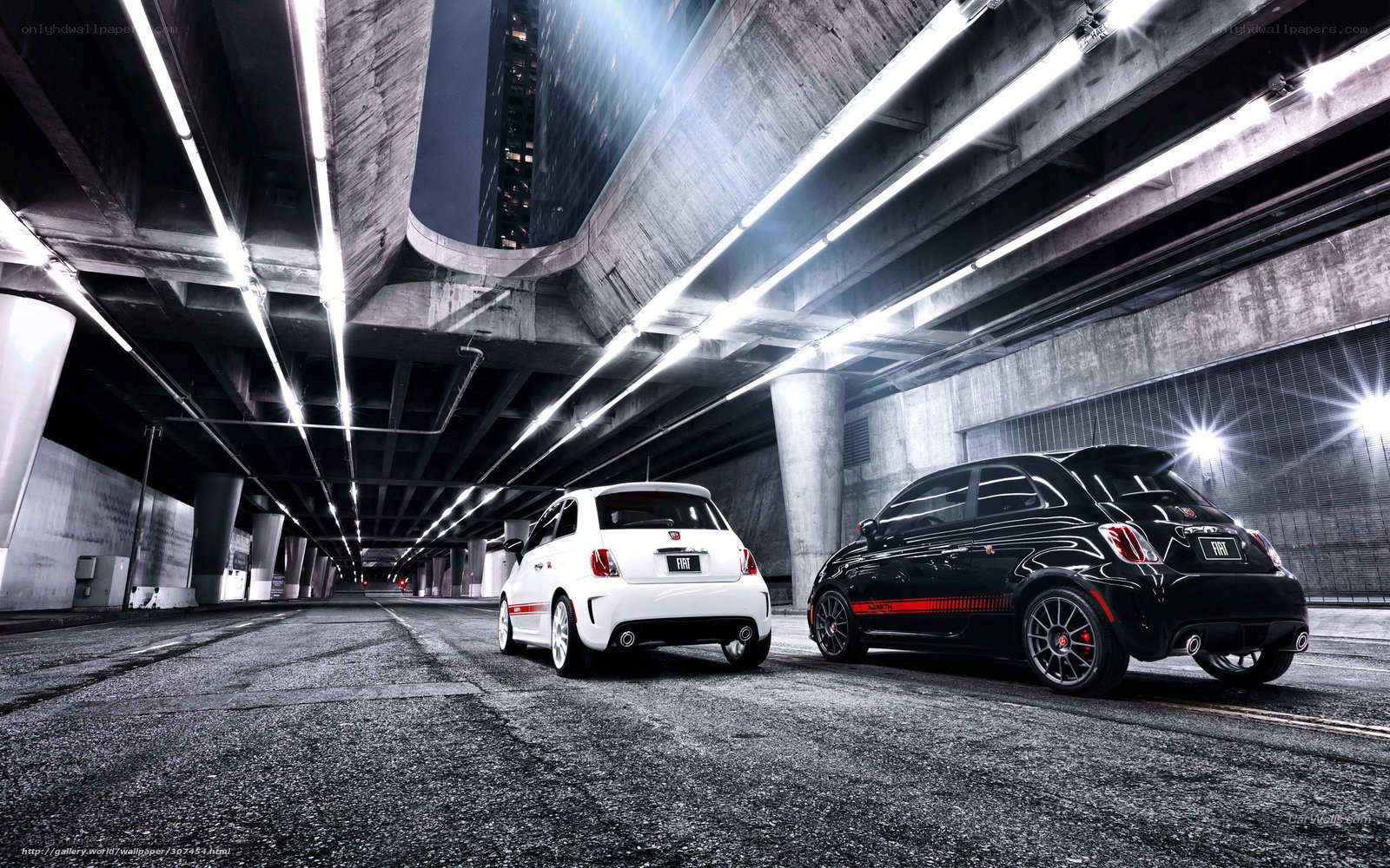 Two Fiat 500 cars in tunnel
