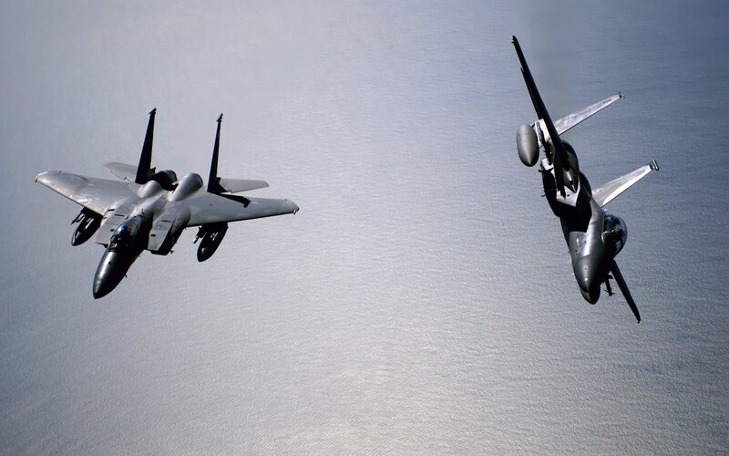 Two fighter jets in flight