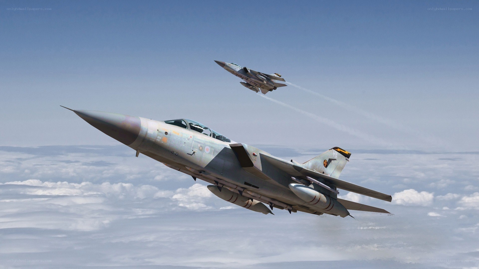 Two fighter jets in flight