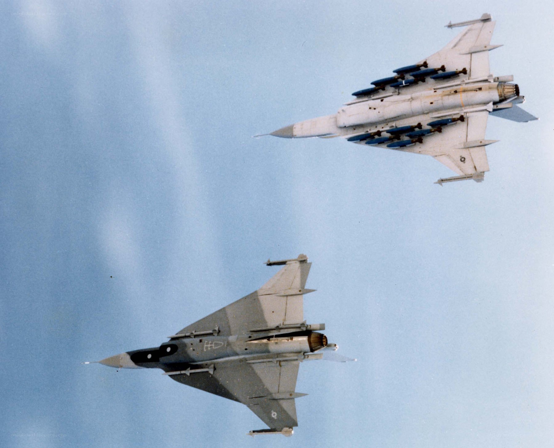 Two fighter jets in flight