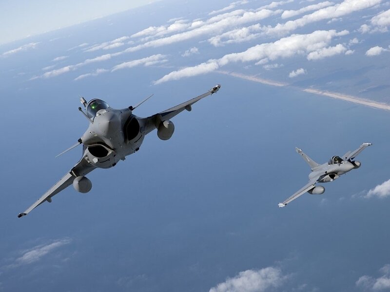 Two fighter jets in flight