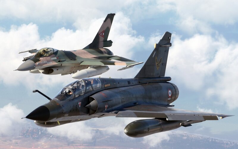 Two fighter jets in flight