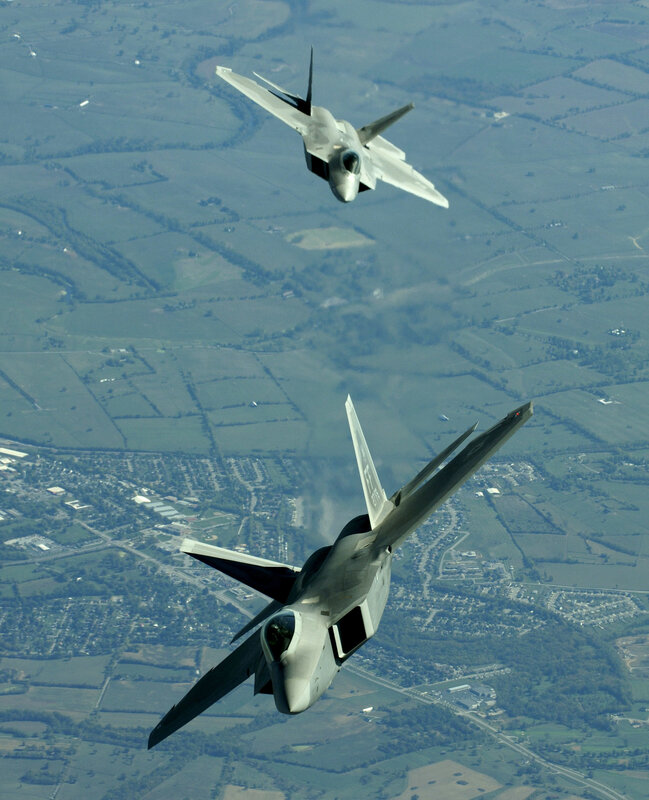 Two fighter jets in flight