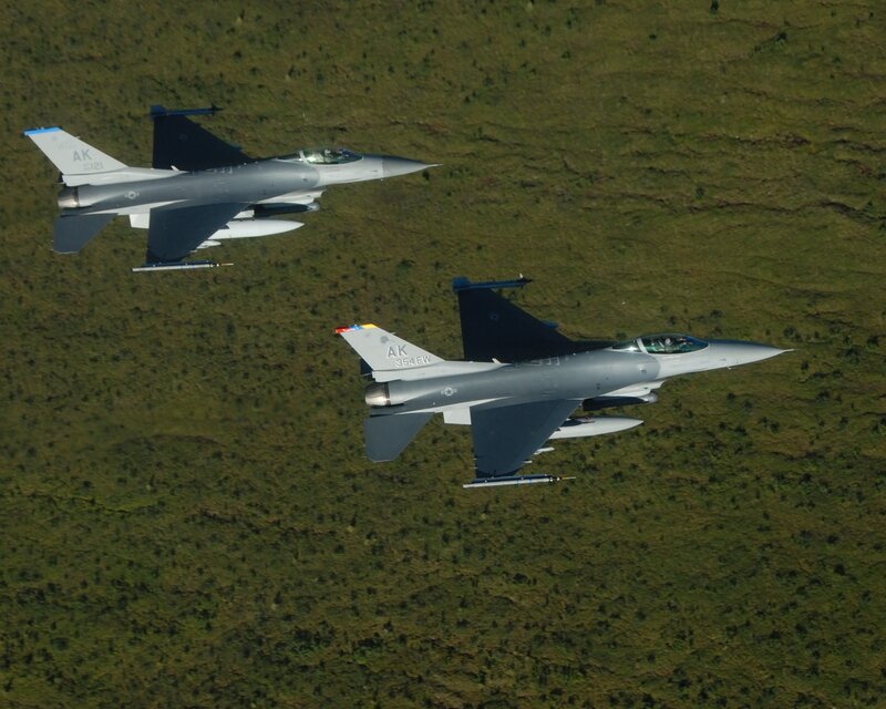 Two fighter jets in flight