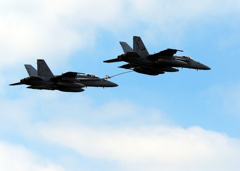 Two fighter jets in flight