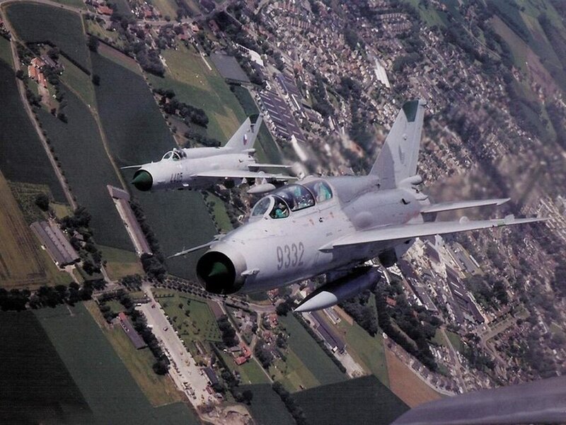 Two fighter jets in flight